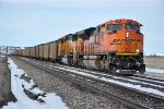 Loaded coal train rolls east